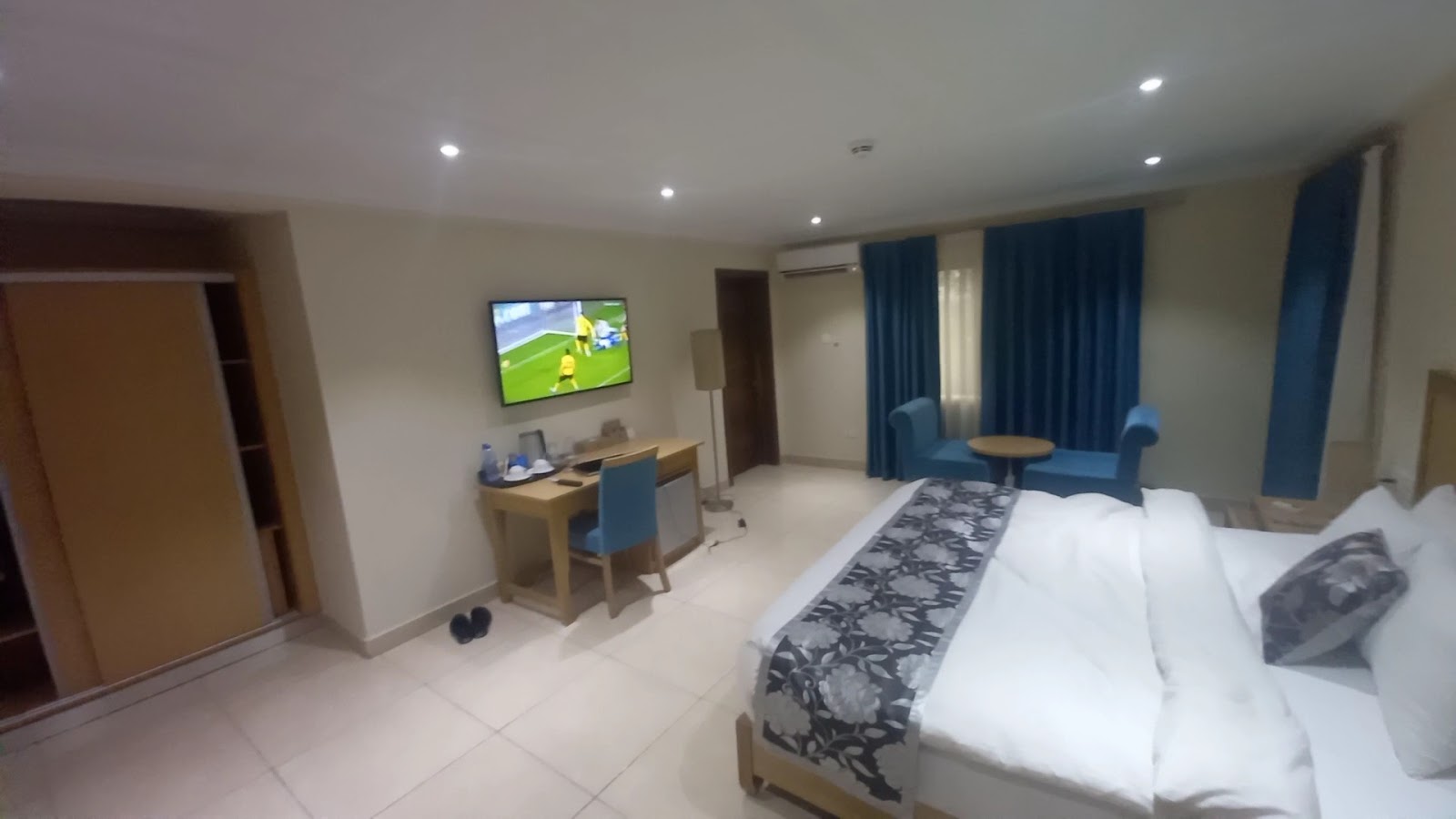 Executive suite with a king bed, large lounge and entertainment area