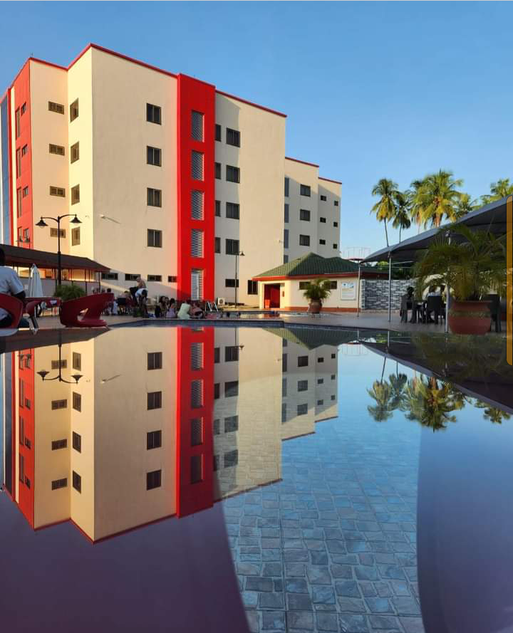 The hotel reflected in the pool